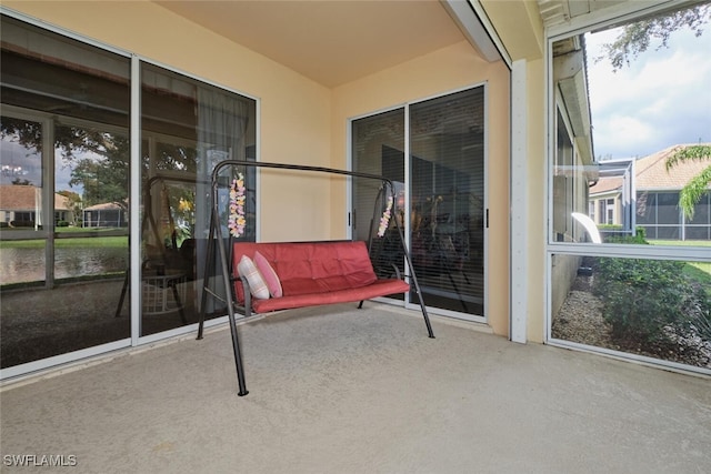 sunroom / solarium featuring a healthy amount of sunlight