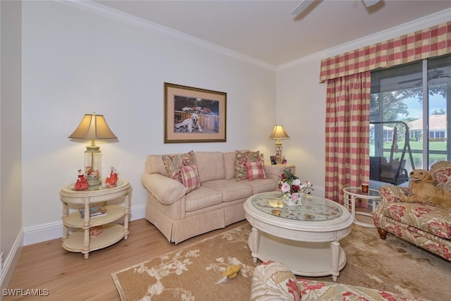 living room with ornamental molding and hardwood / wood-style flooring