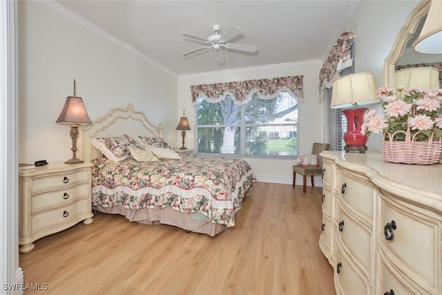 bedroom featuring light wood-type flooring, ceiling fan, and crown molding