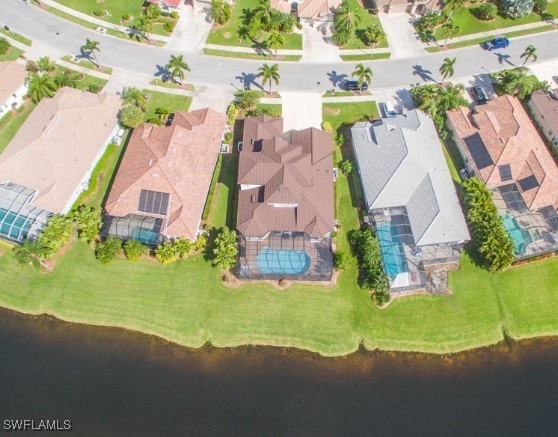 drone / aerial view with a water view