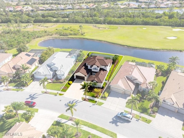 aerial view featuring a water view and a residential view