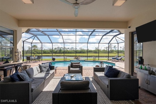 view of patio / terrace with an outdoor pool, glass enclosure, and an outdoor hangout area