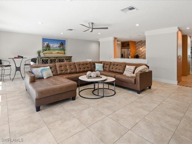 living room with ceiling fan