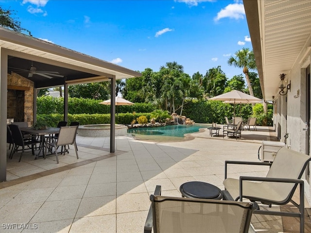 view of patio / terrace featuring ceiling fan