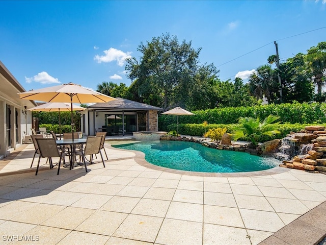 view of pool with a patio area