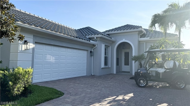 view of front of property with a garage