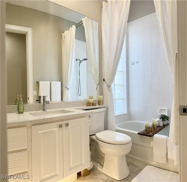 full bathroom with shower / tub combo with curtain, vanity, and toilet