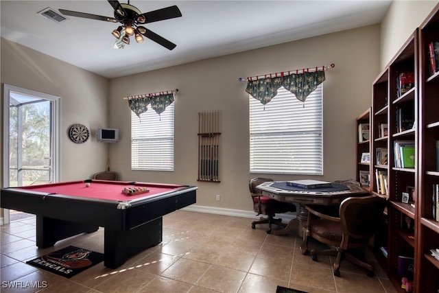 recreation room with ceiling fan, billiards, light tile patterned floors, and a healthy amount of sunlight