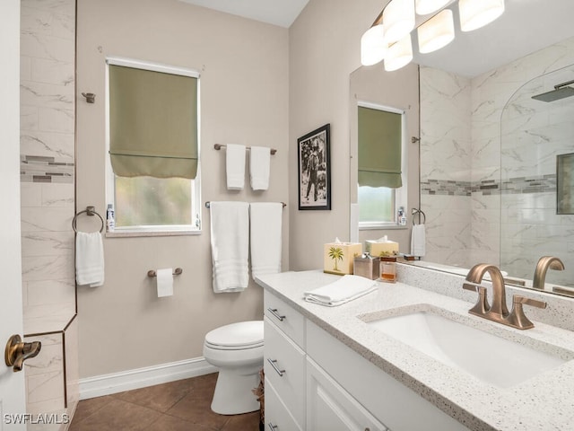 bathroom with vanity, toilet, an enclosed shower, and tile patterned floors