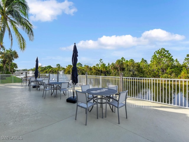 view of patio / terrace featuring a water view