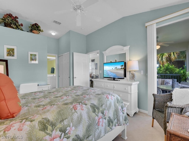 carpeted bedroom with lofted ceiling and ceiling fan