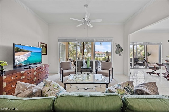 tiled living room featuring ornamental molding and ceiling fan