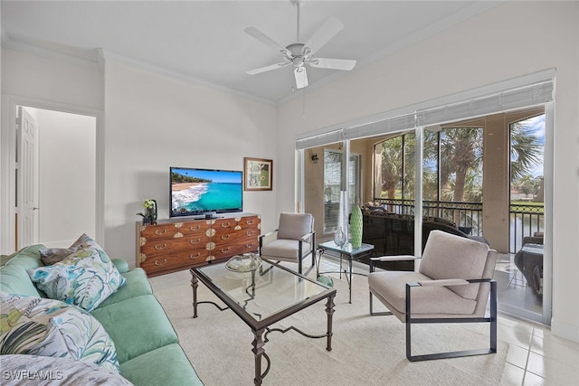 living room featuring light tile patterned flooring, ceiling fan, and ornamental molding