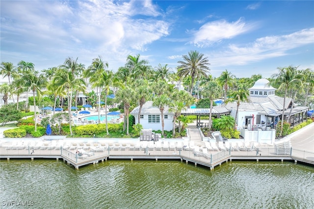 dock area featuring a water view and a patio