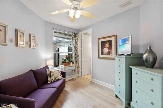 9235 Tesoro Ln Unit 4-102, Naples, FL 34114 - sitting room featuring visible vents, light wood-style flooring, a ceiling fan, and baseboards