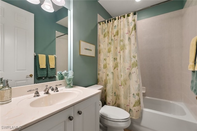 full bathroom featuring shower / bath combination with curtain, vanity, and toilet