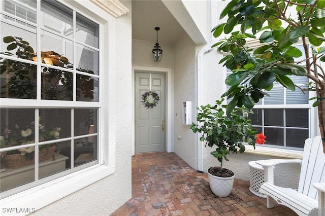 9235 Tesoro Ln Unit 4-102, Naples, FL 34114 - entrance to property with stucco siding