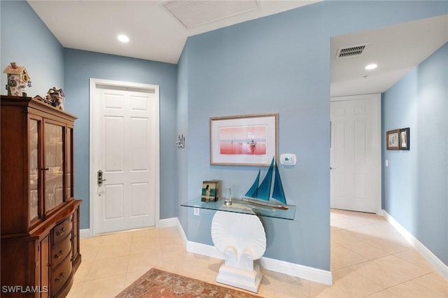 9235 Tesoro Ln Unit 4-102, Naples, FL 34114 - foyer featuring visible vents, baseboards, and light tile patterned floors
