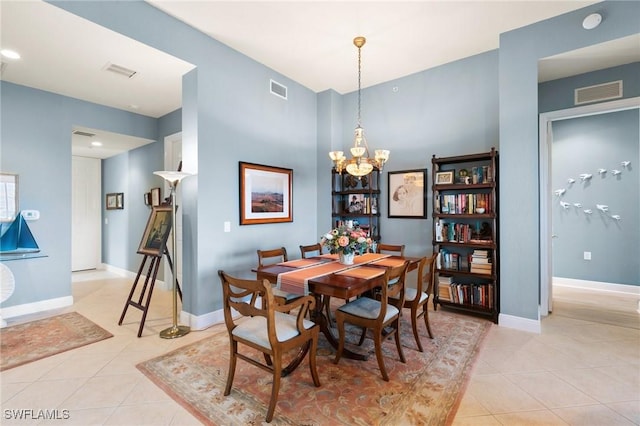 9235 Tesoro Ln Unit 4-102, Naples, FL 34114 - dining room with a chandelier, light tile patterned floors, and visible vents