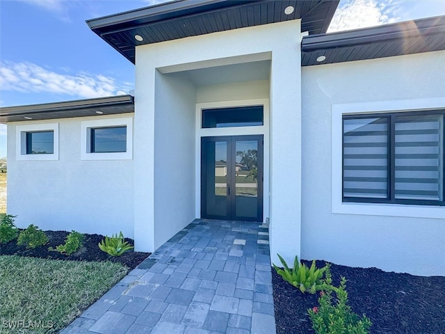 view of exterior entry with french doors