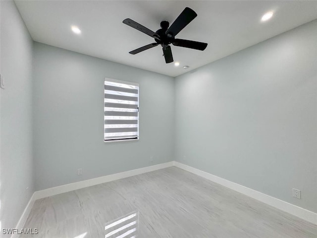 unfurnished room with ceiling fan and light hardwood / wood-style floors