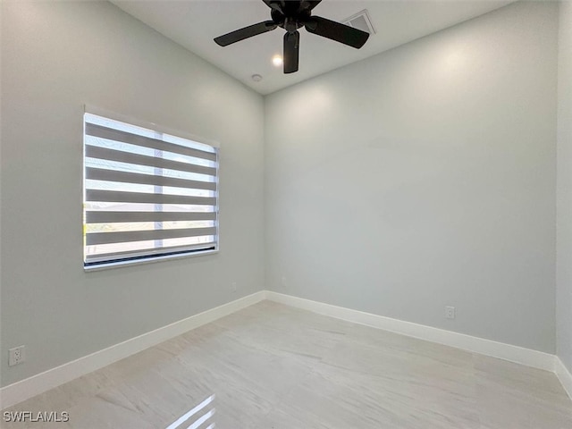 spare room featuring ceiling fan