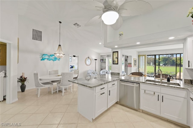 kitchen with dishwasher, high vaulted ceiling, sink, and white cabinets