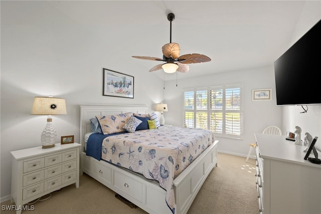 bedroom featuring ceiling fan and light colored carpet