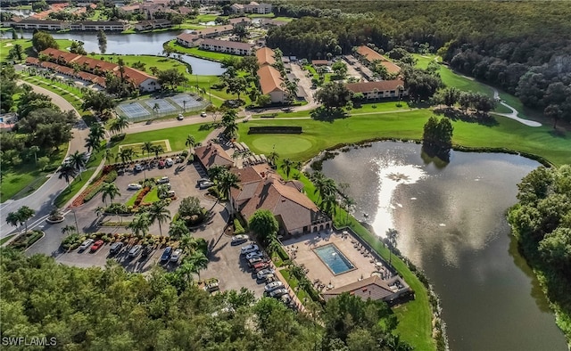 bird's eye view with a water view