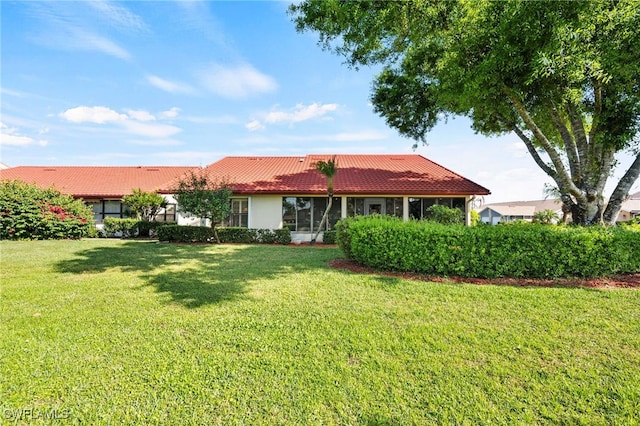 exterior space with a yard