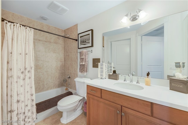 full bathroom with tile patterned flooring, shower / bath combo, vanity, and toilet