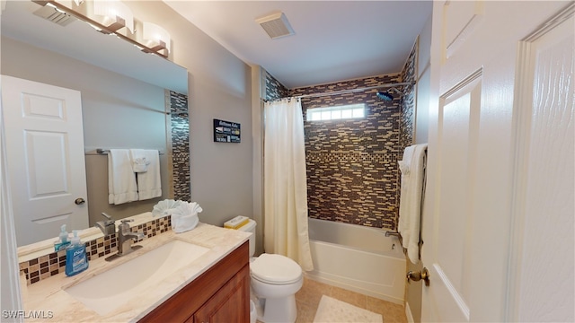 full bathroom featuring shower / bath combo, tile patterned flooring, vanity, and toilet