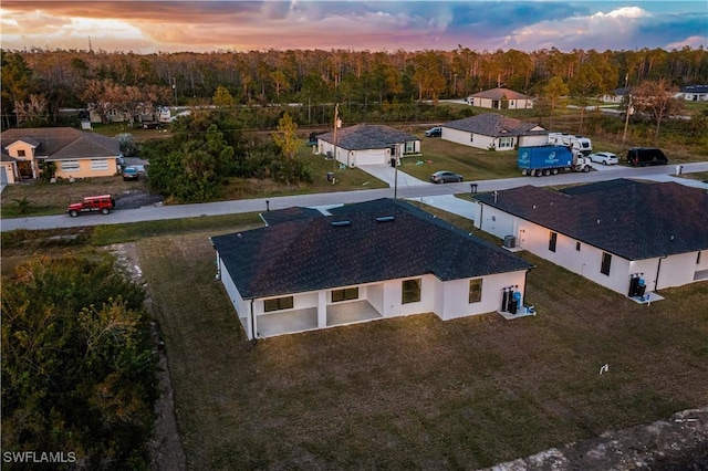 view of aerial view at dusk