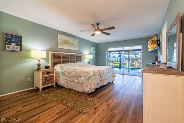 bedroom featuring ceiling fan, access to exterior, and hardwood / wood-style floors