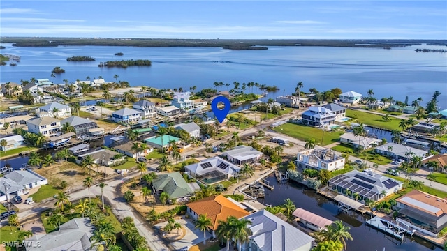 bird's eye view with a water view