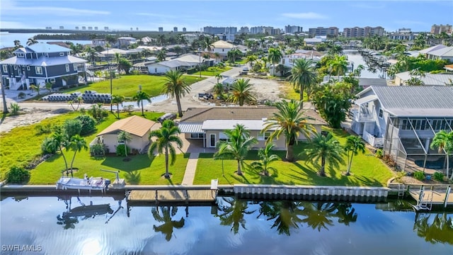 drone / aerial view with a water view