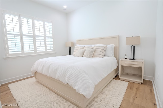 bedroom featuring light wood-type flooring