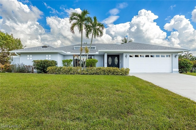 ranch-style house with a front lawn and a garage