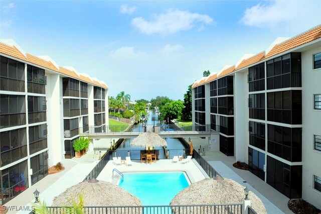 view of pool featuring a patio