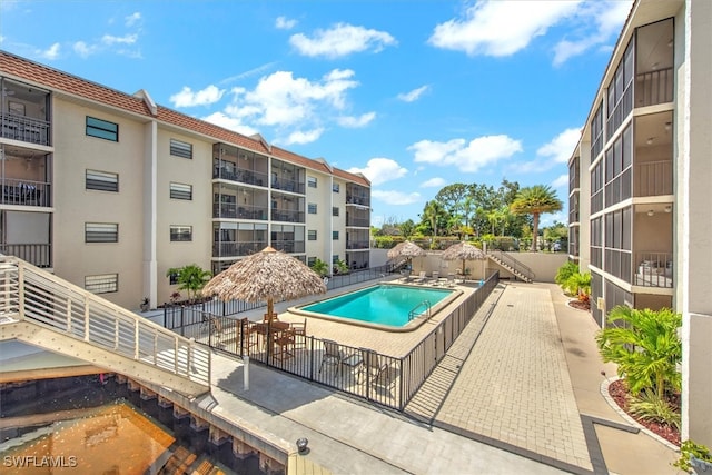 view of swimming pool with a patio area