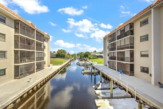 dock area featuring a water view