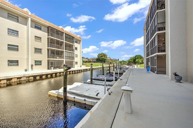 dock area with a water view