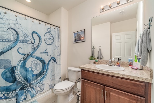 full bathroom featuring shower / bath combination with curtain, tile patterned floors, vanity, and toilet