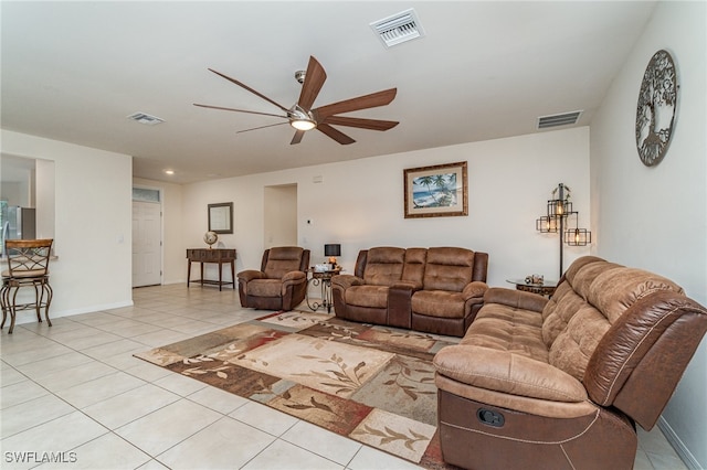 tiled living room featuring ceiling fan