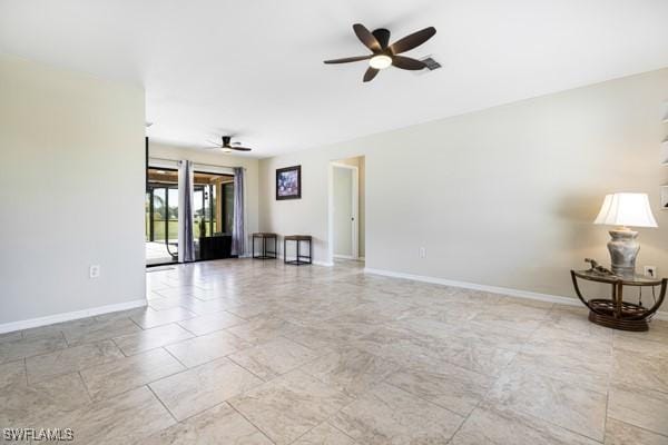 unfurnished room featuring ceiling fan