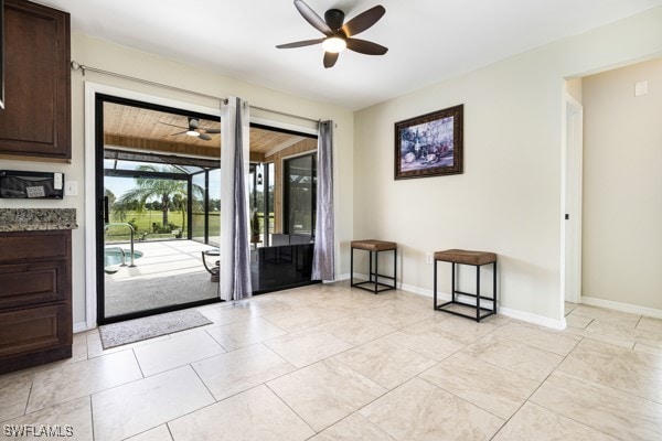 entryway featuring ceiling fan