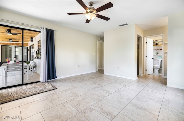 spare room featuring ceiling fan