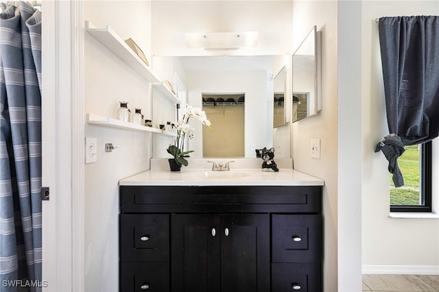 bathroom with vanity and tile patterned floors