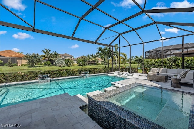 view of swimming pool featuring a lanai, an outdoor hangout area, an in ground hot tub, and a patio area