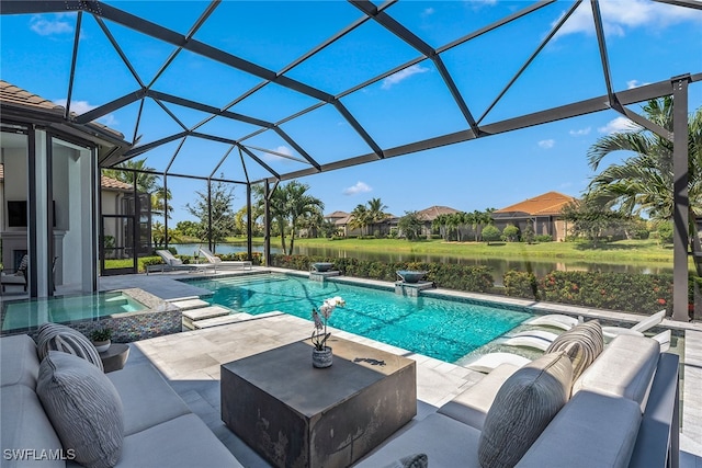 view of swimming pool with a patio, glass enclosure, and a water view